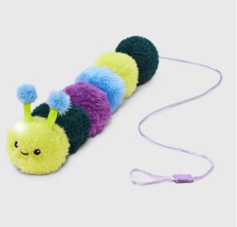 Colorful pom-pom caterpillar cat wand toy with smiley face, blue and purple segments, and a purple string handle on a white background